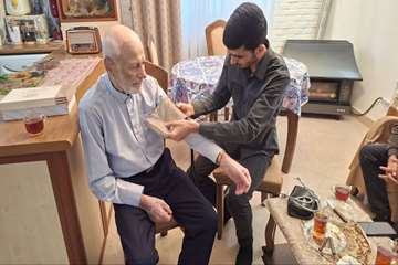 دیدار صمیمی اعضای دانشکده بهداشت با خانواده شهید «رضا حسین‌پور خناچاه» 